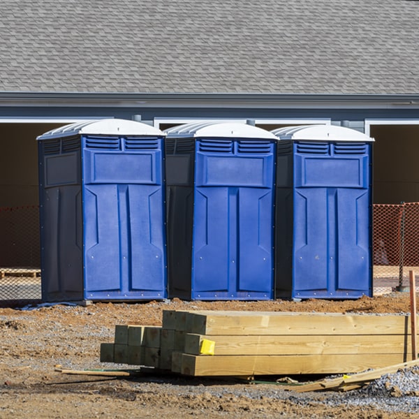 what is the maximum capacity for a single portable toilet in Raymond